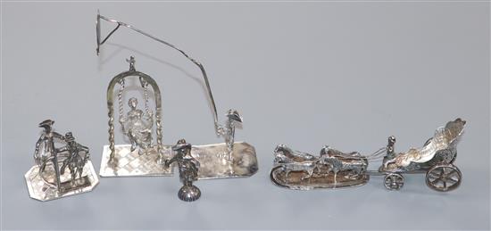 A 19th century Dutch silver miniature model of a horse-drawn carriage and various other miniature figures,